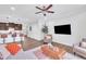 Spacious living area with hardwood flooring, connecting seamlessly with the kitchen and dining spaces at 1156 Craigmeade Dr, Morrisville, NC 27560