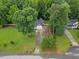 Aerial view showcasing the home's well-manicured front yard and driveway at 119 Valleycastle Ct, Clayton, NC 27520