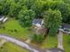 Aerial view of the home showing a large lot and mature trees at 119 Valleycastle Ct, Clayton, NC 27520