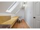 Finished attic space with skylight, built-in desk, and chair offering a versatile and bright work area at 119 Valleycastle Ct, Clayton, NC 27520