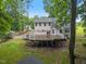 Backyard featuring a spacious wooden deck at 119 Valleycastle Ct, Clayton, NC 27520