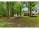 The backyard offers a spacious, partially wooded lot at 119 Valleycastle Ct, Clayton, NC 27520