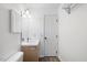 Bathroom with a vanity, decorative lighting, mirror, and a toilet, providing a functional and stylish space at 119 Valleycastle Ct, Clayton, NC 27520