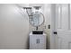 Stylish half-bathroom featuring a modern vanity with a rectangular sink and a decorative mirror at 119 Valleycastle Ct, Clayton, NC 27520