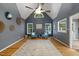 Inviting living room with vaulted ceilings, neutral paint, and large windows offering natural light at 119 Valleycastle Ct, Clayton, NC 27520