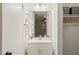 Bright bathroom with a modern mirror and vanity with storage at 1200 Schaub Dr # G, Raleigh, NC 27606