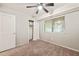 Bedroom with large window and closet with white curtain at 1200 Schaub Dr # G, Raleigh, NC 27606