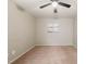 Carpeted bedroom features a ceiling fan and ample space at 1200 Schaub Dr # G, Raleigh, NC 27606