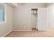 Cozy bedroom with neutral carpet and closet offering storage at 1200 Schaub Dr # G, Raleigh, NC 27606