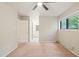 Spacious bedroom leads into a bright bathroom with a window at 1200 Schaub Dr # G, Raleigh, NC 27606