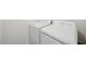 Laundry area featuring modern, white washer and dryer appliances at 1205 Solace Way, Rolesville, NC 27571
