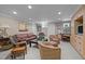 Spacious finished basement providing a cozy seating area and functional workspace with built-in features at 1217 Aycock Ave, Burlington, NC 27215