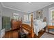 Large bedroom with a wooden bed and lots of space at 1217 Aycock Ave, Burlington, NC 27215