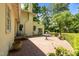 Spacious brick patio with outdoor seating, perfect for entertaining and enjoying the serene backyard at 1217 Aycock Ave, Burlington, NC 27215