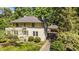 A lovely home with manicured greenery and a detached two-car garage with an extended driveway at 1217 Aycock Ave, Burlington, NC 27215