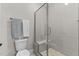 Bathroom features a glass enclosed tiled shower and neutral color palette at 1229 Perry Bluff Dr, Wake Forest, NC 27587
