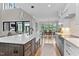 Gourmet kitchen featuring a large island, open floor plan, and stainless steel appliances at 1229 Perry Bluff Dr, Wake Forest, NC 27587