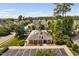 Community clubhouse with swimming pool surrounded by meticulously maintained landscaping at 128 Low Country Ct, Morrisville, NC 27560