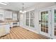 Kitchen with access to dining area and screened porch at 128 Low Country Ct, Morrisville, NC 27560