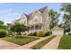 Lovely traditional home with a detached garage and driveway with mature landscaping at 128 Low Country Ct, Morrisville, NC 27560