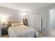 Serene bedroom retreat with neutral walls, hardwood floors, and natural light at 130 E Longview St # Apt S, Chapel Hill, NC 27516