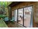 Patio area leading into living room with bamboo forest at 130 E Longview St # Apt S, Chapel Hill, NC 27516