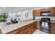Inviting living area integrated with a stylish kitchen featuring a granite counter at 130 E Longview St # Apt S, Chapel Hill, NC 27516