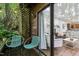 Patio area leading into living room with bamboo forest at 130 E Longview St # Apt S, Chapel Hill, NC 27516