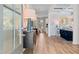 Elegant entryway featuring a view into the dining area, with modern decor and hardwood floors at 147 Sugar Pine Drive, Franklinton, NC 27525