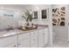 Stylish bathroom boasting double vanities with marble countertops, decorative accents, and a luxurious spa-like ambiance at 148 Sugar Pine Drive, Franklinton, NC 27525