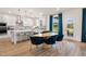 Stylish kitchen with stainless steel appliances and adjacent breakfast area with backyard views at 148 Sugar Pine Drive, Franklinton, NC 27525