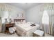 Bright bedroom with neutral walls, and white trim offers a cozy and inviting atmosphere at 1517 Hodges Chapel Rd, Benson, NC 27504