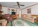 Comfortable living room with plush seating and a ceiling fan at 1517 Hodges Chapel Rd, Benson, NC 27504