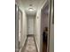 An interior hallway boasts fresh paint and updated flooring at 1634 Hurdle Mills Rd, Roxboro, NC 27574