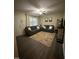 Inviting living room features hardwood floors, comfortable seating, and natural light at 1634 Hurdle Mills Rd, Roxboro, NC 27574