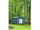 Exterior view of metal outbuilding at 1634 Hurdle Mills Rd, Roxboro, NC 27574