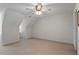 Empty bedroom with large window, carpeted floors, and ceiling fan at 1703 Berwickshire Cir, Raleigh, NC 27615