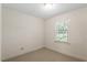 Neutral bedroom featuring natural light from a window at 1703 Berwickshire Cir, Raleigh, NC 27615