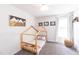 Charming bedroom features a stylish bed frame and mountain-themed decor at 1816 Piperwood Ct, Durham, NC 27713