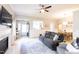 Inviting living room provides a cozy fireplace and seamless flow to the dining and entryway at 1816 Piperwood Ct, Durham, NC 27713