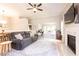 Inviting living room with fireplace, wood floors, and neutral decor offers a comfortable living space at 1816 Piperwood Ct, Durham, NC 27713