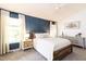 Spacious main bedroom features a bright window, dresser and soft, neutral decor at 1816 Piperwood Ct, Durham, NC 27713