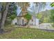Quaint home featuring a patio space and garden in a lush backyard at 1917 Washington St, Durham, NC 27704
