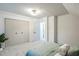 Bedroom with closet, carpeted floor, paneled ceiling and neutral colored walls at 1917 Washington St, Durham, NC 27704