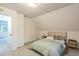 Bright bedroom with carpeted floor, paneled ceiling, and neutral colored walls at 1917 Washington St, Durham, NC 27704