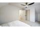 Bedroom with closet, carpeted floor, paneled ceiling and ceiling fan at 1917 Washington St, Durham, NC 27704