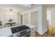 Stylish kitchen featuring gas cooktop island, stainless steel appliances, and a dining area at 1917 Washington St, Durham, NC 27704