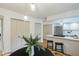 Bright kitchen featuring stainless steel appliances, wooden cabinets, hardwood floors, and pendant lighting at 1917 Washington St, Durham, NC 27704