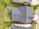 Aerial view of a home with a well-maintained roof and fenced backyard at 192 Logbridge Rd, Chapel Hill, NC 27516