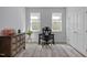 Bright home office space with two large windows and ample space for a desk and storage at 192 Logbridge Rd, Chapel Hill, NC 27516